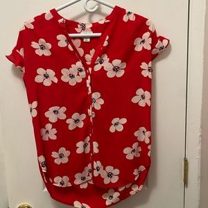 Red, floral blouse